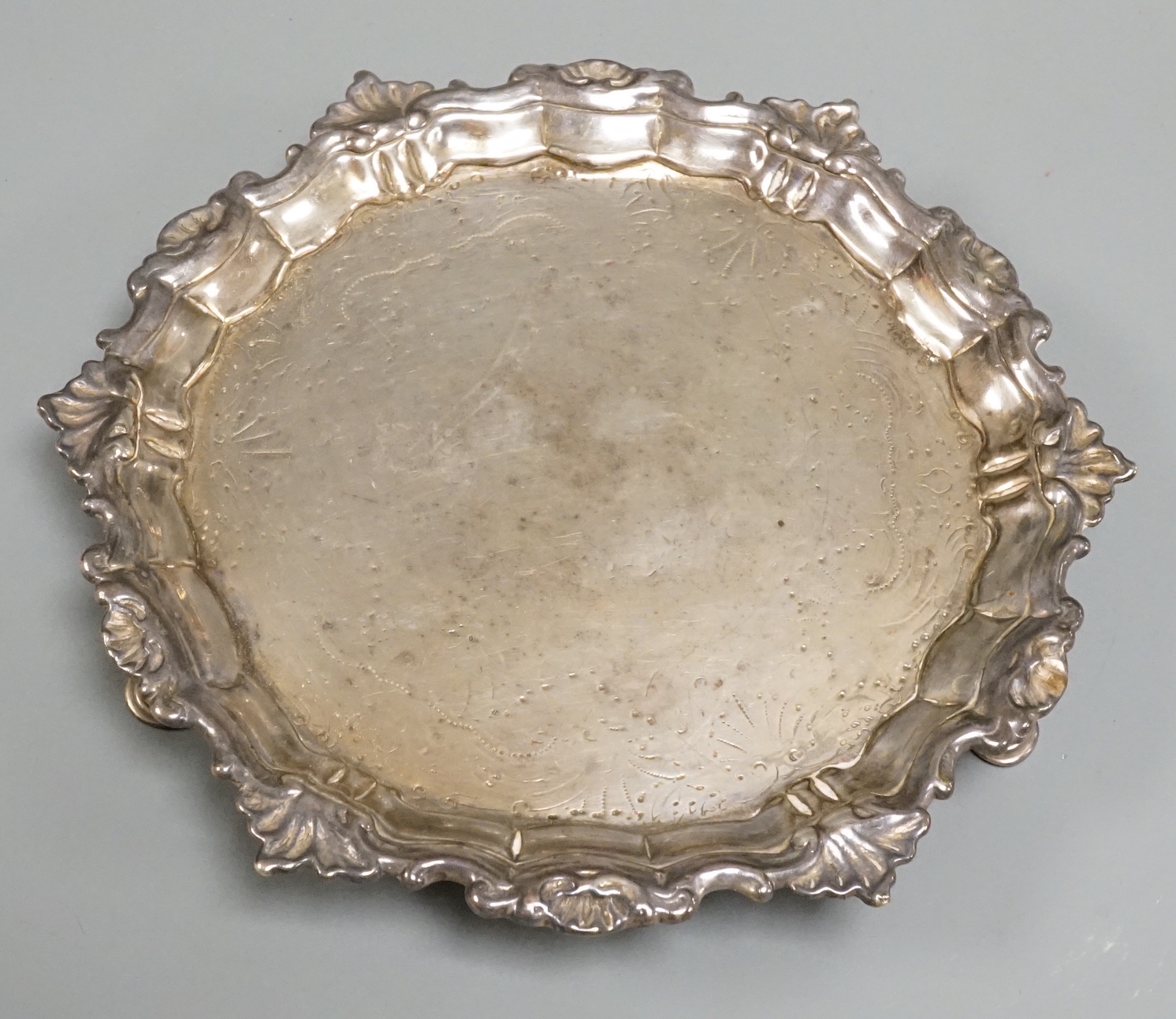 A George III silver waiter, marks rubbed, 18.6cm, 8.3oz.